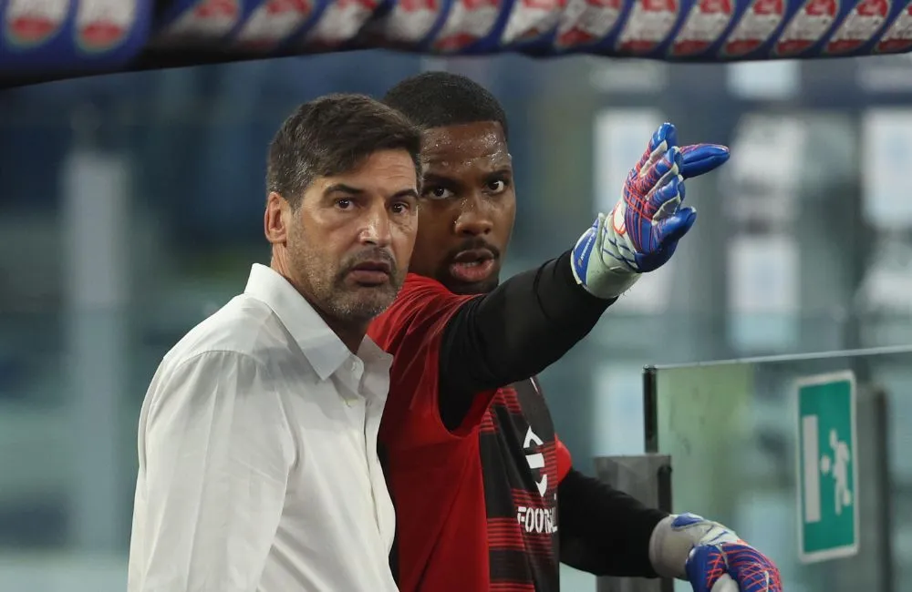 Milan: Paulo Fonseca, Mike Maignan (Photo Credit: Agenzia Fotogramma)